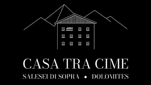 Casa tra cime